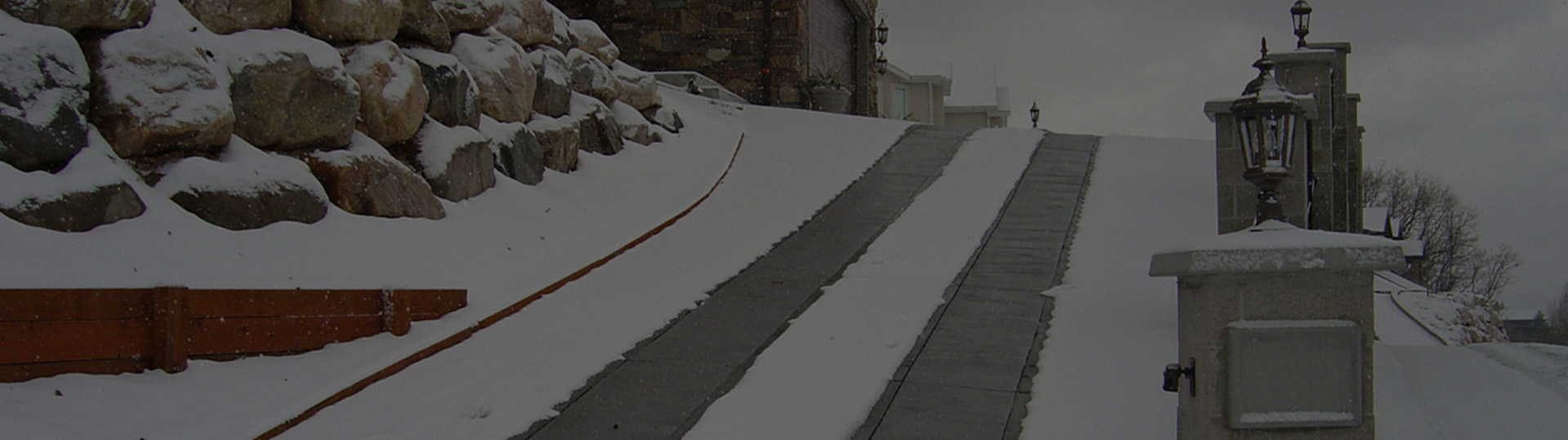 Heated driveway with tire tracks banner