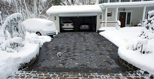 A radiant heated paver driveway.